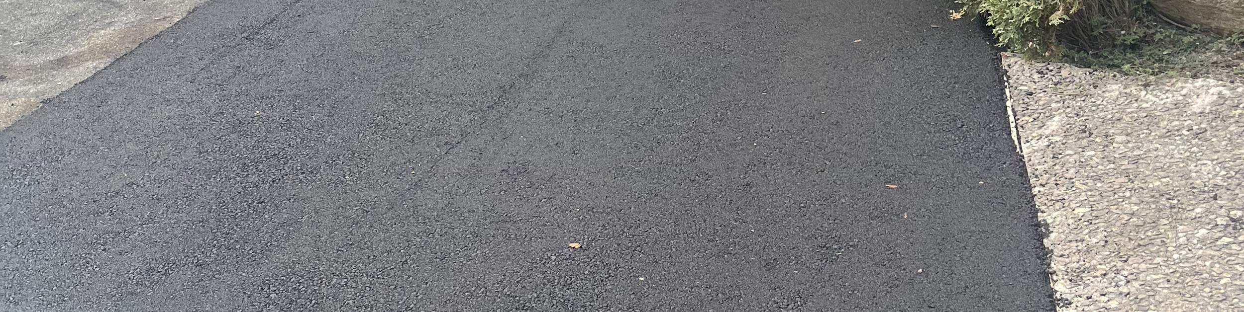 Driveway with brick accent in Braintree, MA