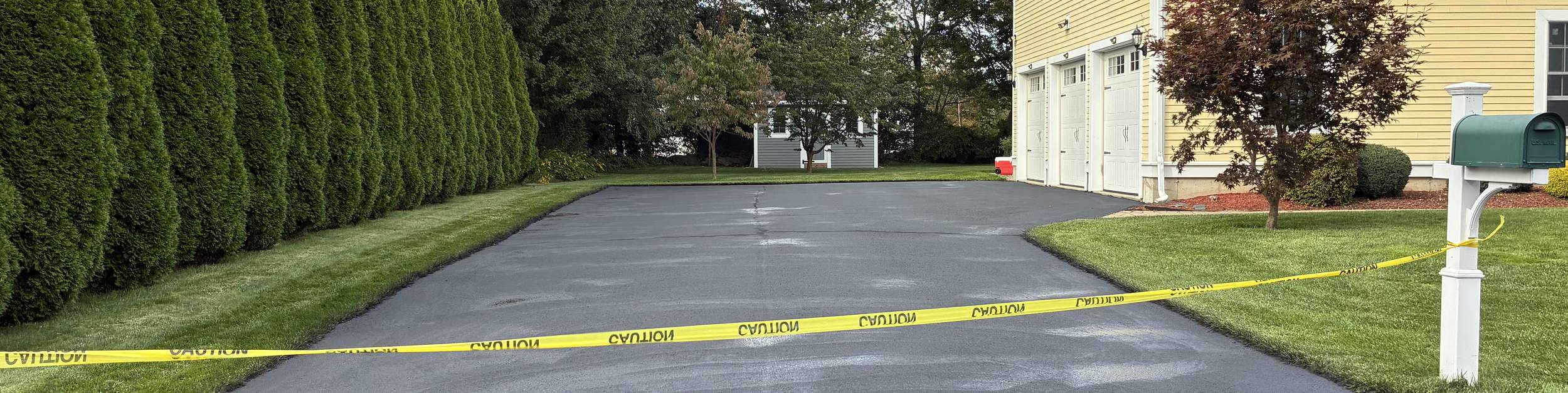 Colonial home driveway in Milton, MA