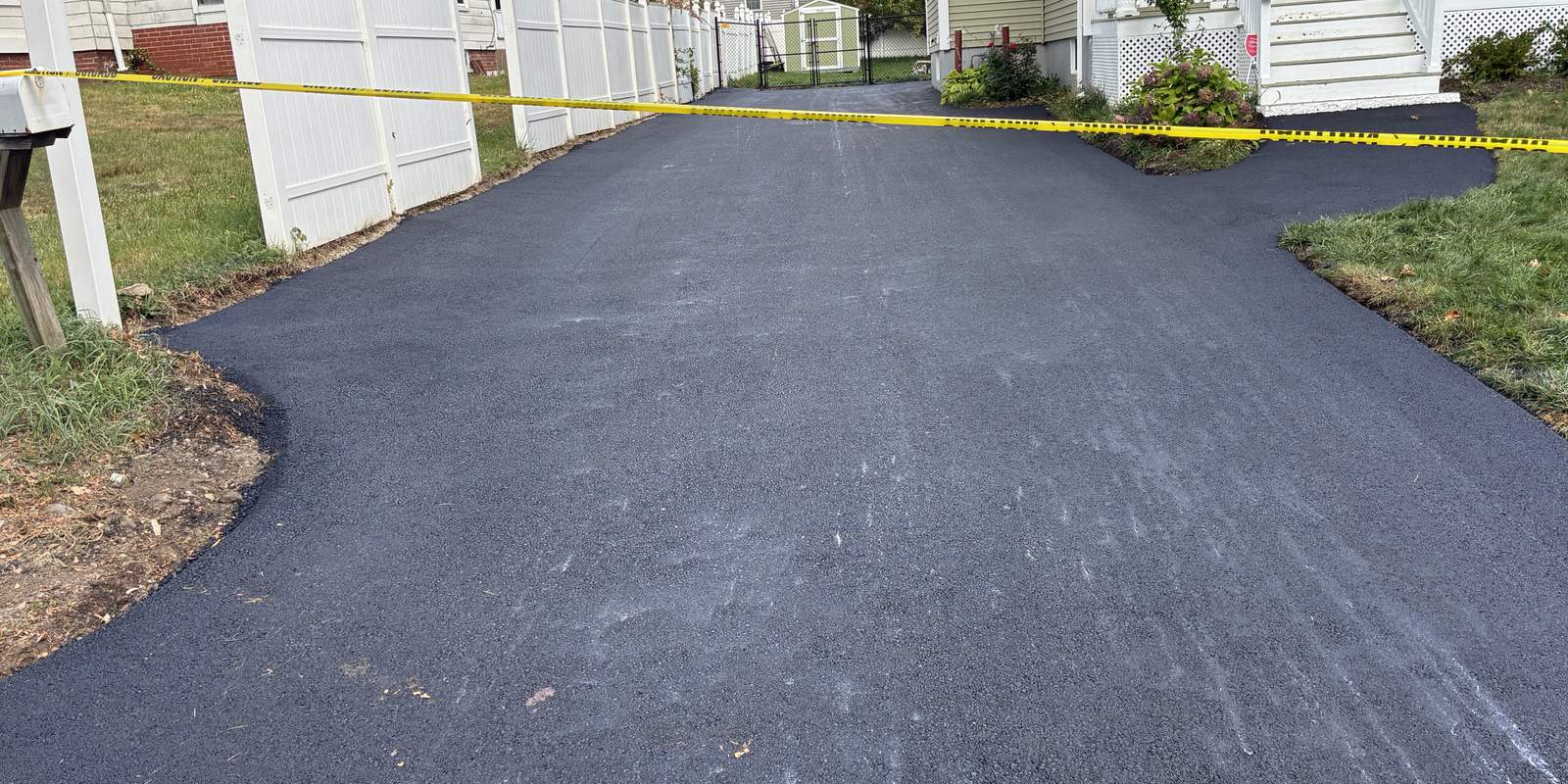 Freshly paved residential driveway on the South Shore
