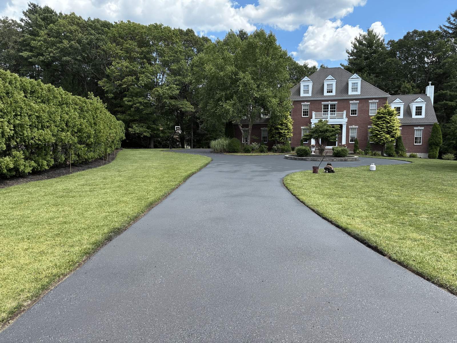 Freshly paved asphalt driveway on the South Shore, MA