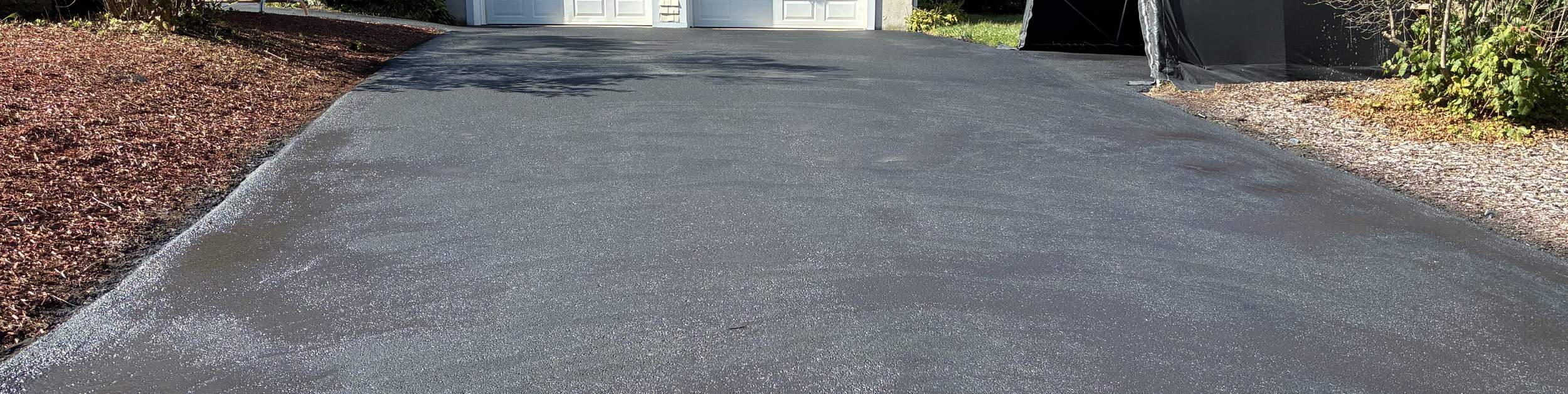 Asphalt driveway at a Quincy, MA home